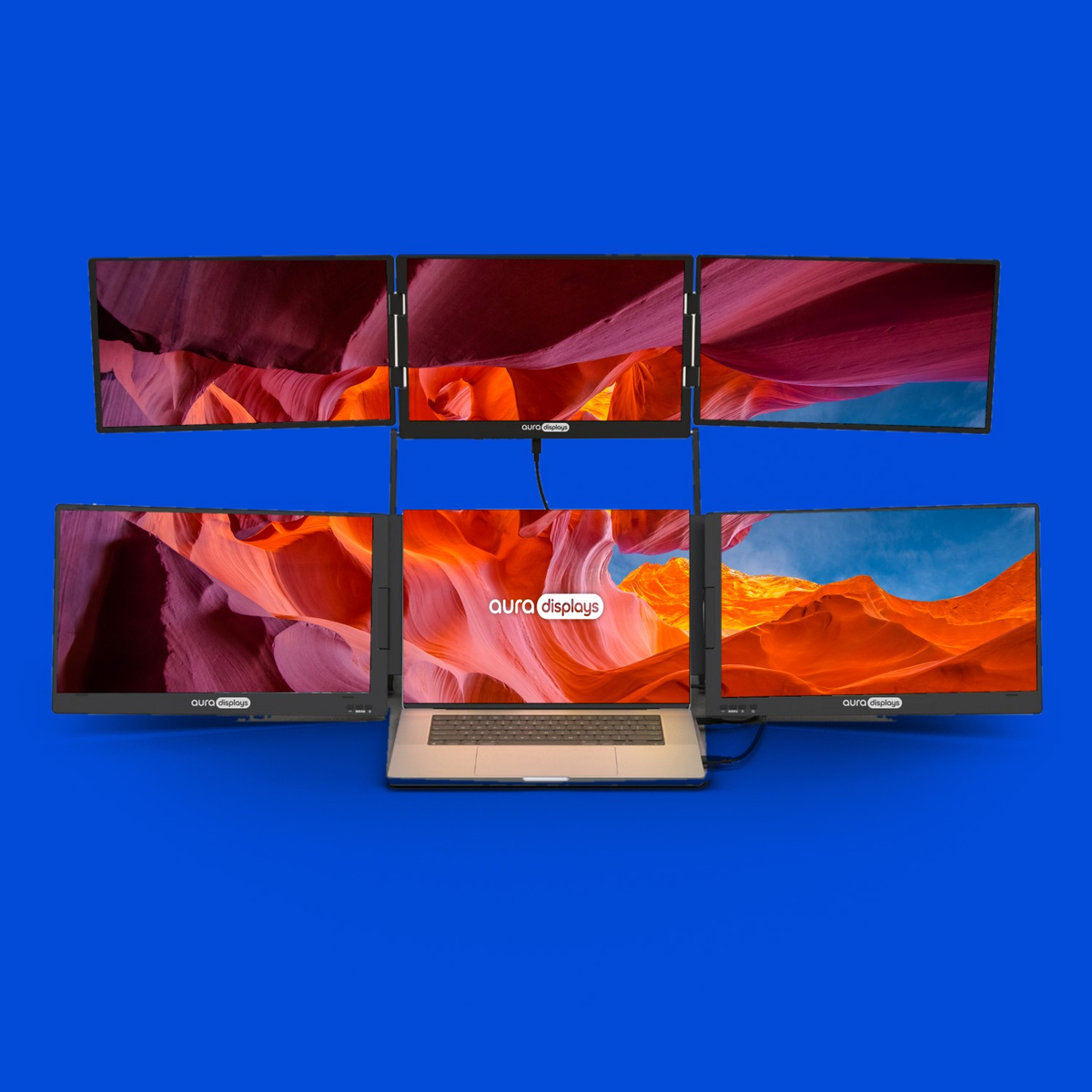 Antelope Canyon wallpaper shown across six Aura Displays screens with a laptop