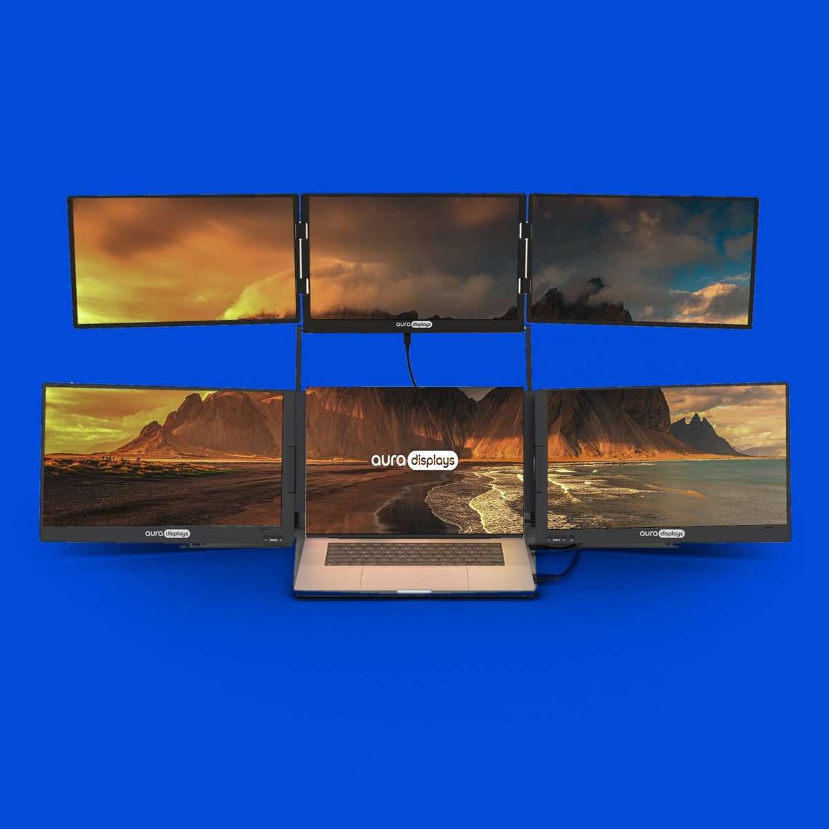 Iceland wallpaper shown across six Aura Displays screens with a laptop